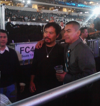 Illustration for article titled Jesus Walks Like A Cowboy: Manny Pacquiao Does Dallas